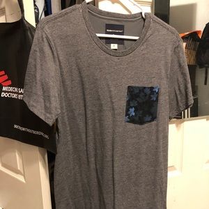 Modern Amusement pocket tee